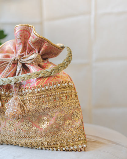 Peach Pink & Golden Banarasi Potli With Broad Sequin Pearl Lacework