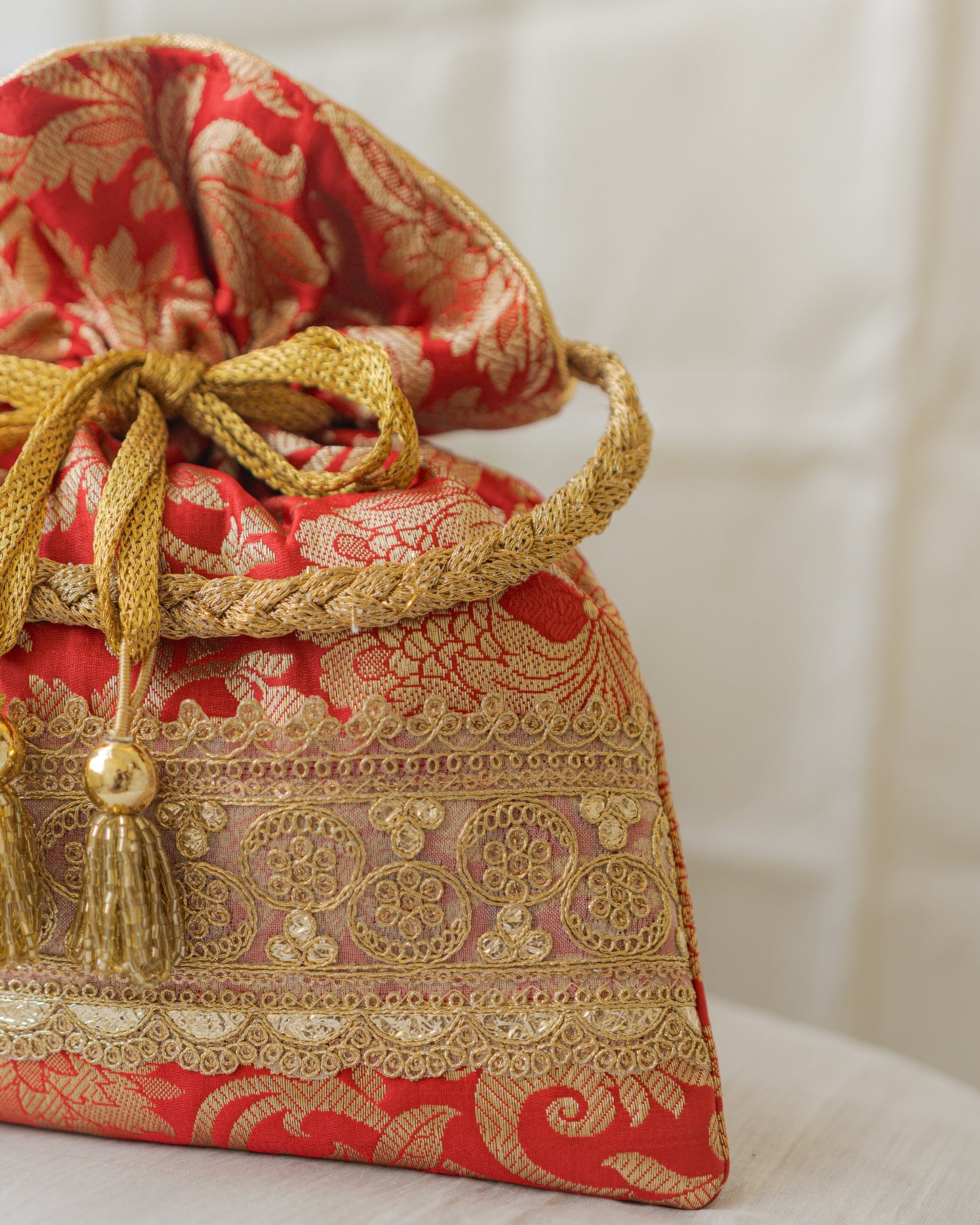 Red  & Golden Banarasi Potli With Golden Broad Lace