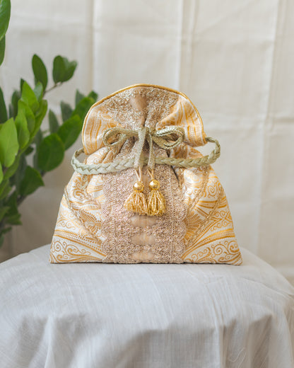 White & Golden Banarasi Potli With Broad Lace & Golden Glass Tassels