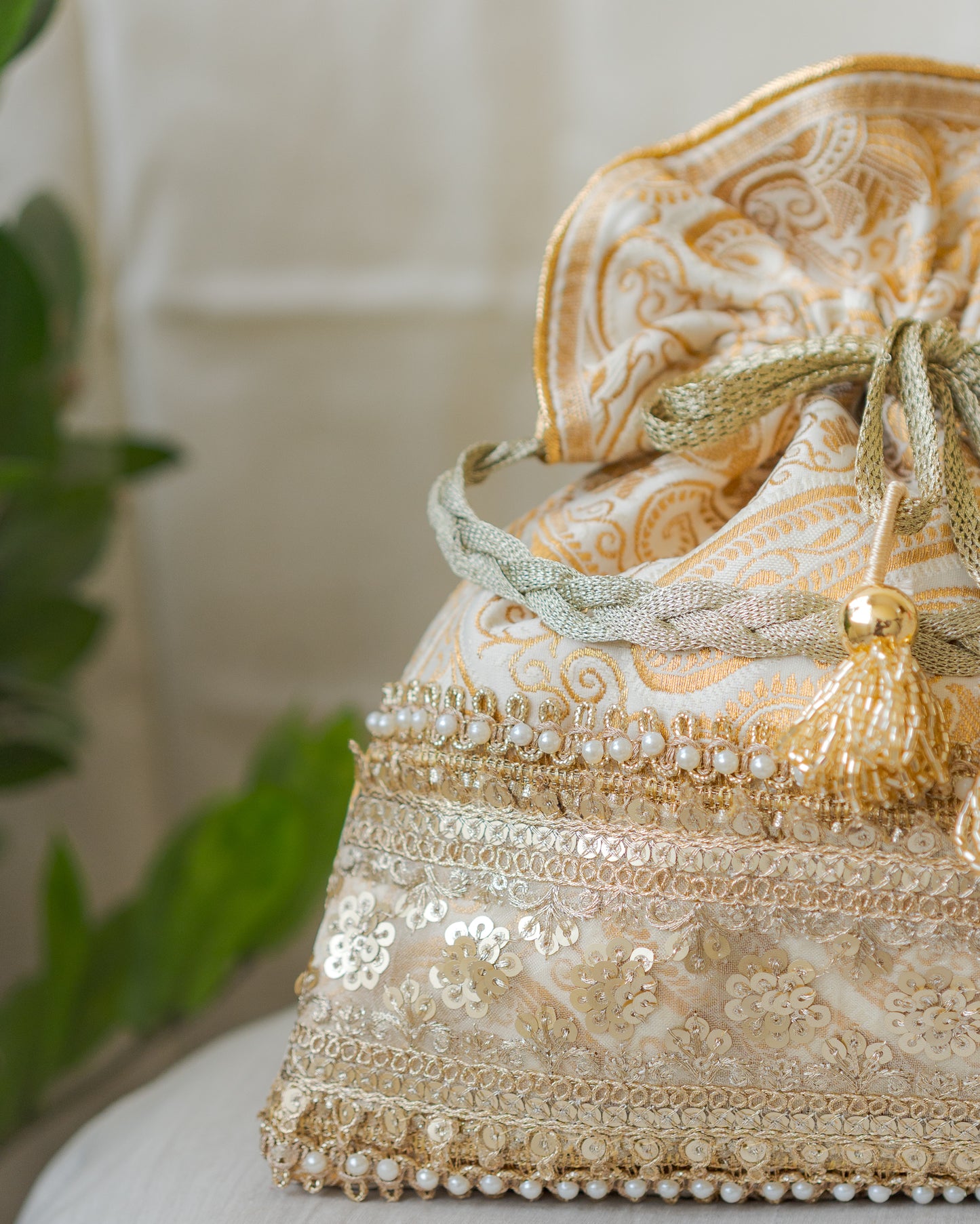 Royal White & Golden Banarasi Potli With Broad Sequin Pearl Lacework