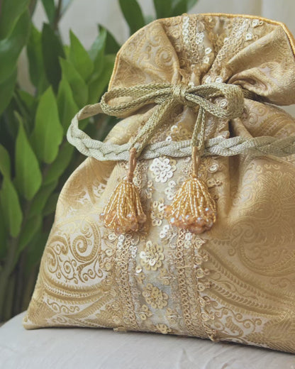 Chikoo Golden Banarasi Potli With Sequin Lace & Glass Tassels